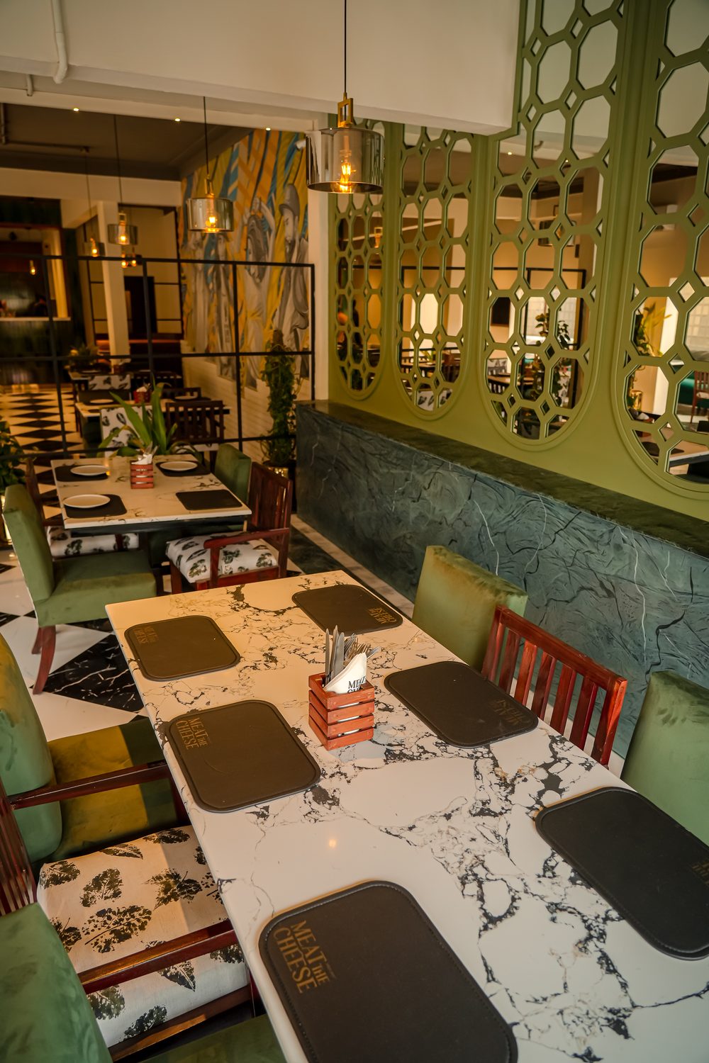 Tables toward the mural wall